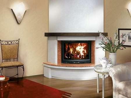 Полукруглый камин в угол комнаты