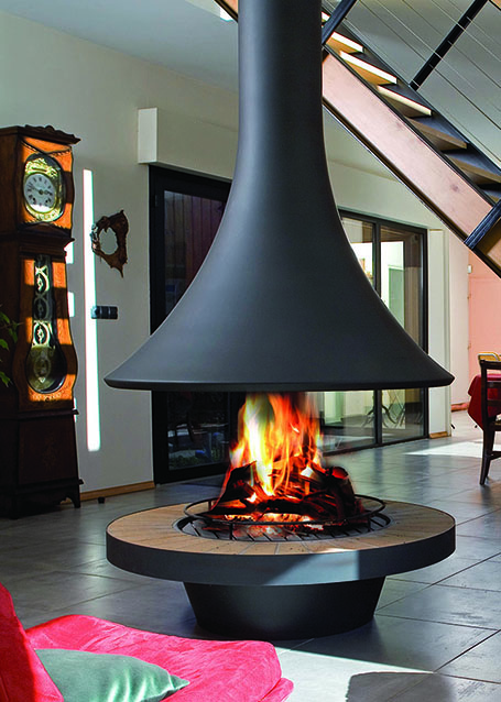 камин круглой формы в интерьере