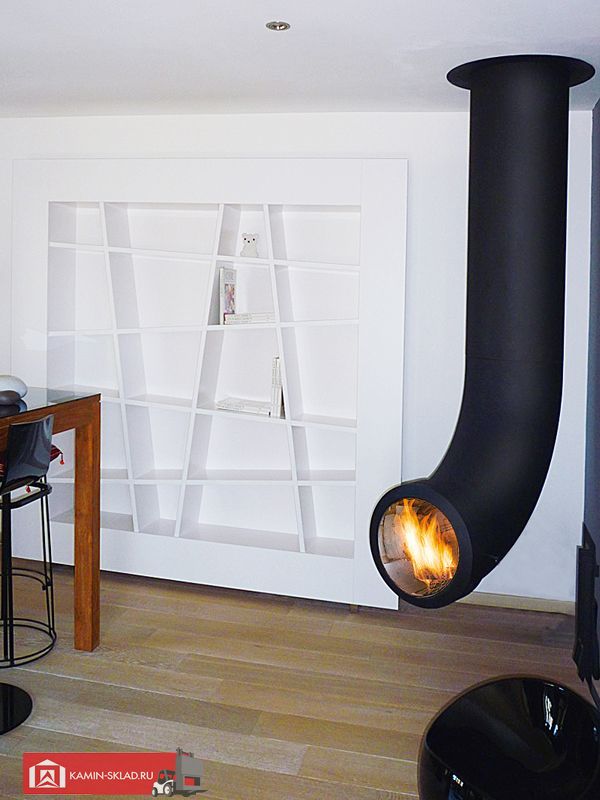 свисающий с полока камин в форме крючка